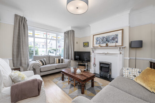 Stylish living room captured by a UK property photographer in North Wales. Cozy, modern interior design.