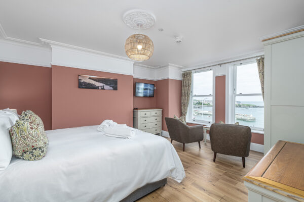 Elegant seaside room captured by UK property photographer, North Wales photographer. Cozy interior with stunning sea view.