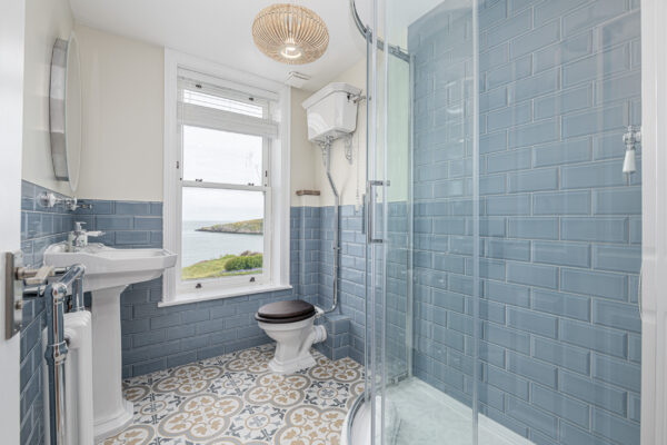 Elegant UK bathroom with ocean view, shot by North Wales property photographer.