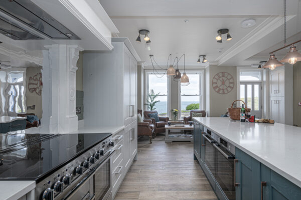 Elegant kitchen interior by UK property photographer, North Wales. Spacious design with sea view.