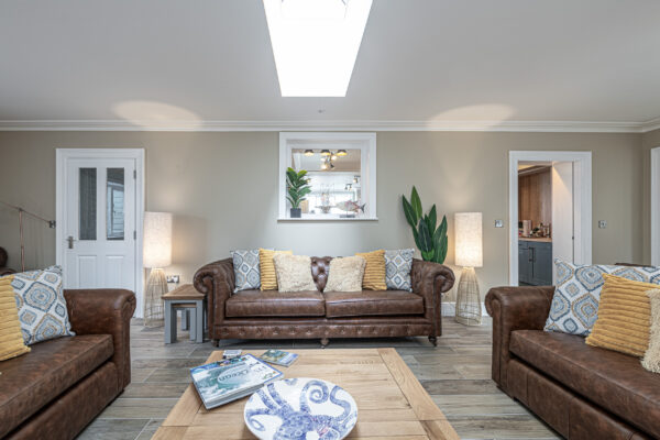 Chic living room captured by a UK property photographer in North Wales, showcasing elegant interior design.