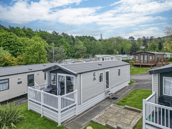 Static caravan homes in scenic woodland, captured by UK property photographer, North Wales photographer.