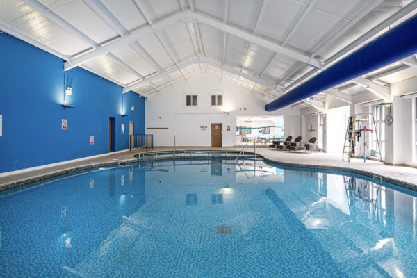 Indoor pool captured by UK property photographer in North Wales. Perfect lighting and architecture showcase.