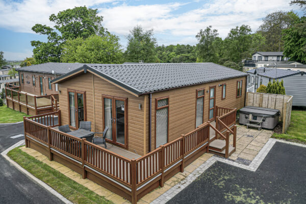 Luxury cabin with hot tub in UK, captured by North Wales property photographer. Ideal for showcasing real estate.