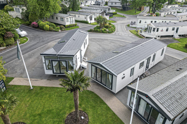 Mobile homes in a scenic park captured by UK property photographer in North Wales. Ideal for real estate showcases.