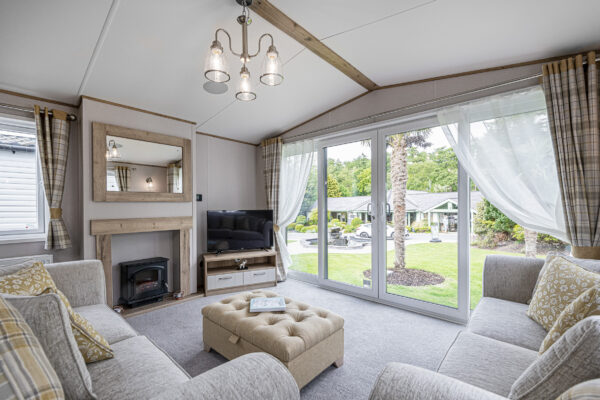 Modern living room with large windows, photographed by UK property photographer in North Wales.