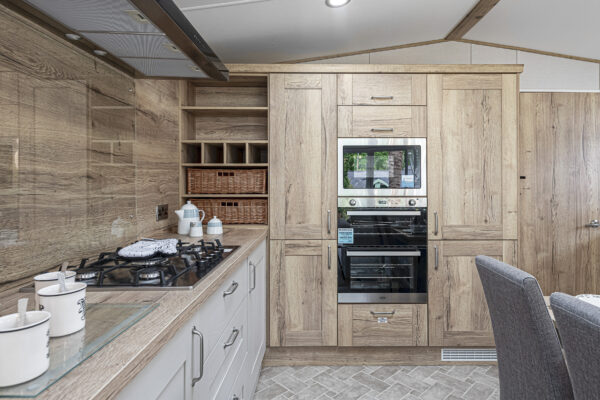 Alt text: Modern kitchen captured by North Wales property photographer, showcasing UK interior design and wood finishes.