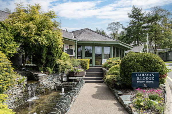 Caravan & Lodge Centre, captured by UK property photographer in North Wales, showcasing lush greenery and scenic beauty.