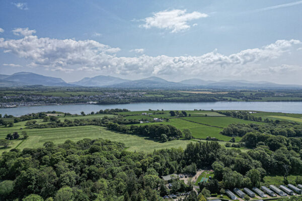 Aerial view of lush landscape in North Wales captured by UK property photographer, showcasing serene natural beauty.